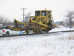 Brush cutter clears up at the east end of West Lib. siding, Jan. 27, 2009.