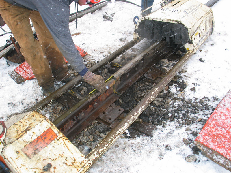 Hydraulic puller pulling a joint together prior to welding.  Dec. 10, 2005.
