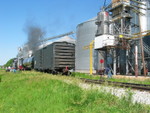 Pulling onto the main to tie onto their train at Booneville, June 9, 2007.