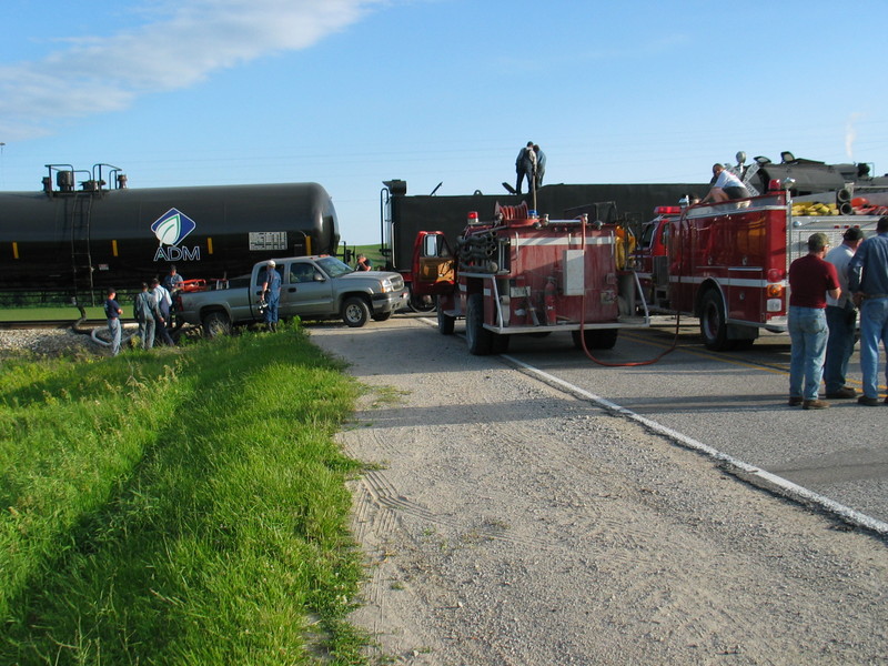 Adding water from the ADM tank into the rear unit; Hancock's fire dept. filling the lead unit.