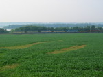 ICE's KCSP train along the Muscatine riverfront at Heinz siding, June 16, 2007.