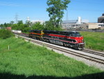 The EB is pulling past Gerdau Ameristeel after meeting the WB at N. Star, June 1, 2010.