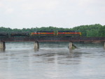 First through freight across the washout heads east across the Cedar River, June 25, 2008.
