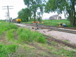 EB passes the track gang on the main after backing out the west end of N. Star siding.