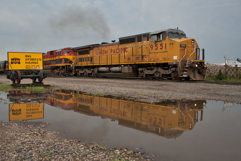 The KCS detour passes 44th Street Rock Island, IL on July 28, 2011.