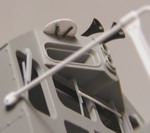 Underside of the EOT antenna ground plane.  It was represented with a half-circle of .010 styrene supported by two wire legs extending forward from holes drilled above the numberboard.