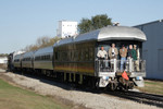 A special train hosting a trip for the Lexington Group heads west through Hawkeye, IA.  IAIS 714 led IANR 678, 3 Amtrak "Amfleet" coaches, and IAIS business car "Hawkeye."  14-Oct-2006.