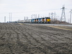 East train passes Mid American's sub 56 west of Davenport, March 24, 2008.