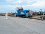 Metra's SW1 at Blue Island, with the outbound west train waiting in the background, March 24, 2008.