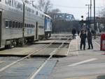 Westbound Metra running wrong main at Blue Island, governed by the "high green" dwarf signal between the tracks.