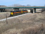 Bureau Rocket heads south under I-180, south of Bureau.  The train is 30 or so loads of Distiller's Grains off the IC&E.