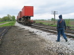 Eastbound's conductor prepares to "ride the point" to protect their shove over crossings while backing out the west end of N. Star siding, May 11, 2008.