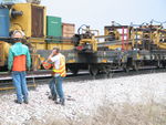 Threading the next rail into the spreader.