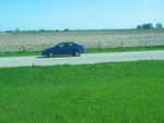 Barry passes the train in his new wheels, on 6 west of Stuart.