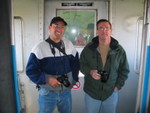 Russ Lyon from Washington and Larry Hamilton enjoy the ride in the vestibule.