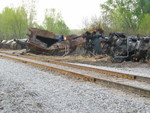 Scrappers are at work cutting up the derailed cars at the Hinkeyville wreck, May 4, 2009.
