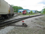 Back over at Blue Island, pigs and the caboose are parked at Evans Yard.