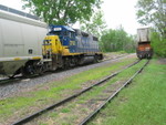 With Chessie finally on the move, their "caboose" passes the stacks parked on the Evans lead.