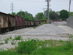 Shoving ballast cars in to be loaded.