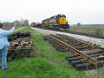 With the east train cleared up on the siding, the westbound turn blasts by on the main.  Looks like N. Star is getting a new west swtich soon. May 1, 2008.