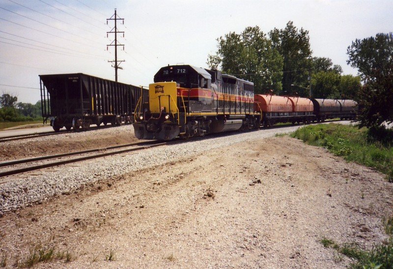 RISW switching Country Stone; HPJX hoppers are on the "Andalusia Main", coil cars are headed for Steel Warehouse.  June 2, 2005.