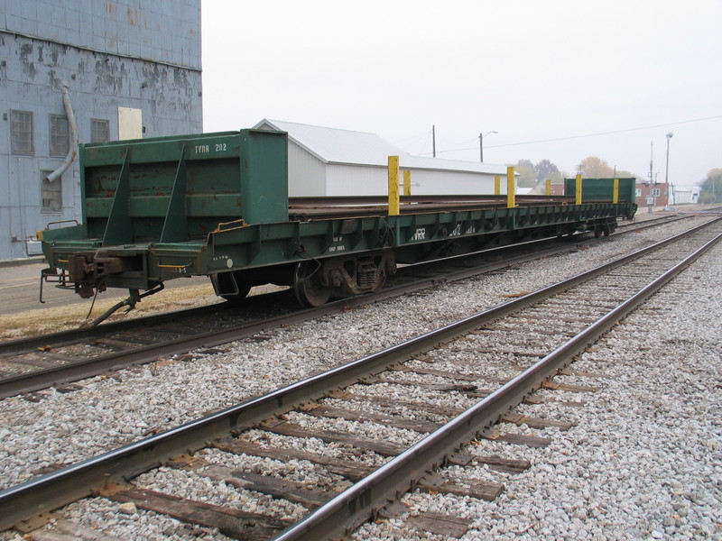 Interesting flatcar load of rails (TVRR 202) on the CENPECO track in Walcott, Oct. 31, 2005.