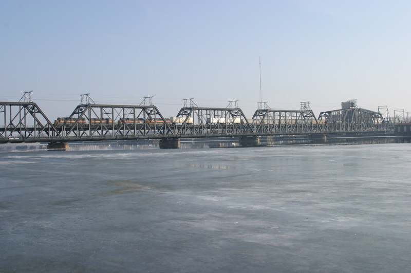 The main section of the Government Bridge over the frozen winter waters.  Davenport is to the left of the photo.