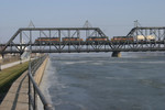 The Davenport end of the bridge, showing the concrete levee.  The bridge passes over US 67 and the IC&E (ex-Milw) tracks to the left of the shot.