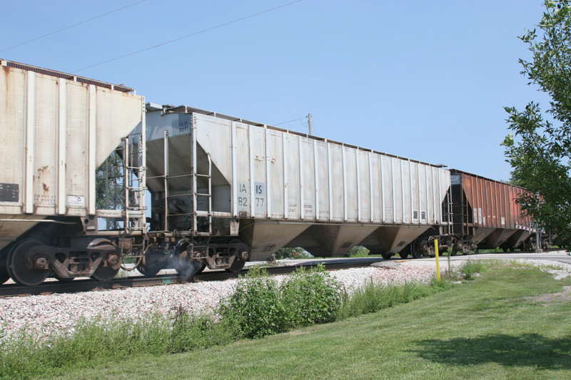 A stuck brake on IAIS 8277.  I smelled it, but didn't see it.   By the next time I caught the train, it had cleared up.