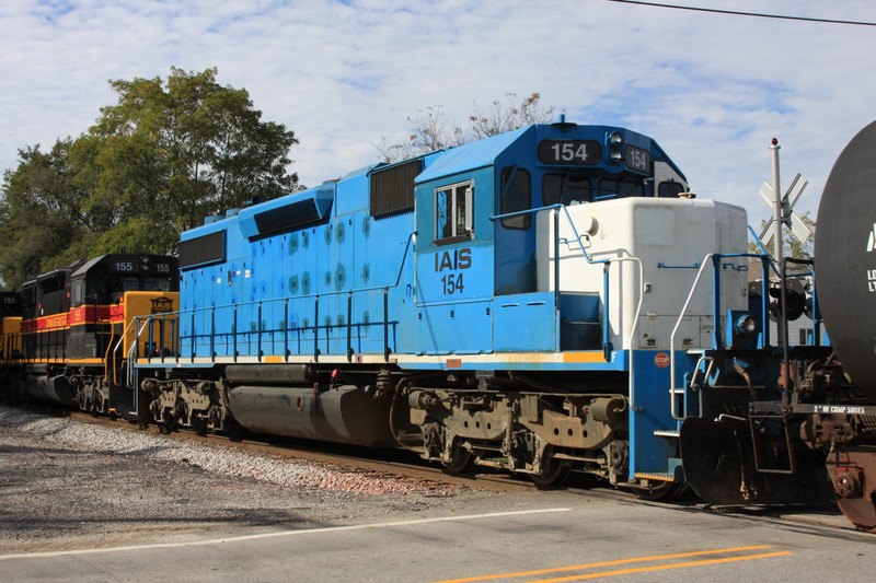 The last unpainted unit on the railroad - IAIS 154.  With the ES44s on the property, will it ever get painted?