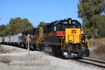 IAIS 156 passing over one of the crossings east of Homestead.  Contrast this with the next shot, taken only three months earlier