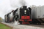 At Homestead, the light engines pass a line of stored grain hoppers