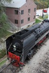 After running through the yard, the engines backed past the old IAIS headquarters towards the 4 track to drop the parts car