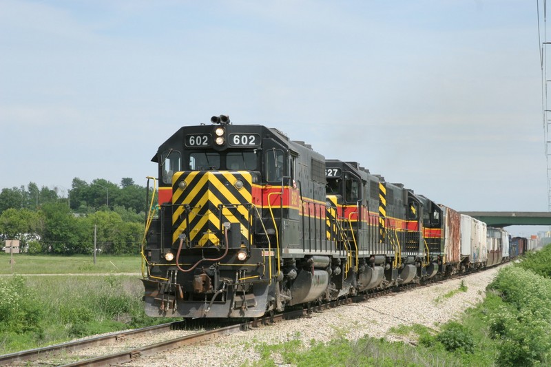 The first sighting of the westbound BICB is just past the I-80 bridge near Coralville, IA.  The power apparently came off the west train and was put on here, with the addition of IAIS 600 on the back.