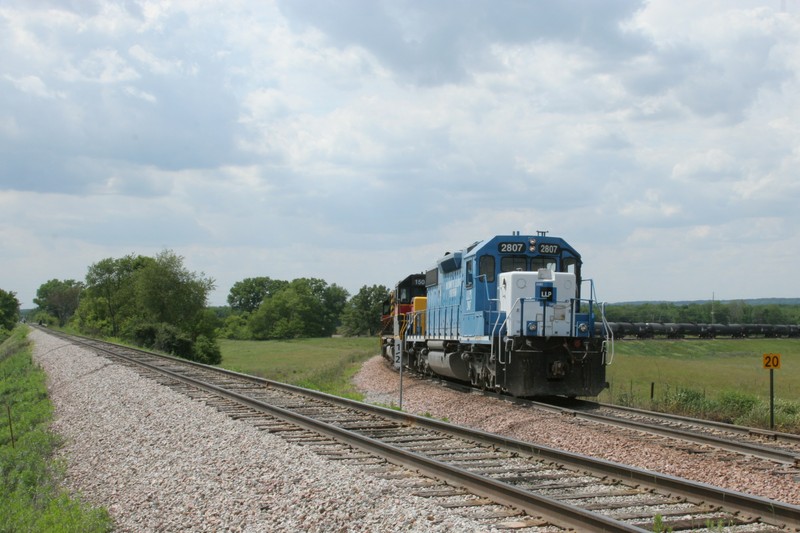 The CRIC crew pulls up to the east Yocum switch and sets the brakes.  Ah ha!  Must mean that the westbound BICB is underway out of Iowa City.