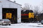 IAIS 156, the other recent SD38-2 addition, sits in the IC squarehouse while 151 idles outside.