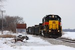 A bit after lunch, IAIS 703 departs Iowa City with the eastbound local, headed for the Gerdau mill at Wilton.