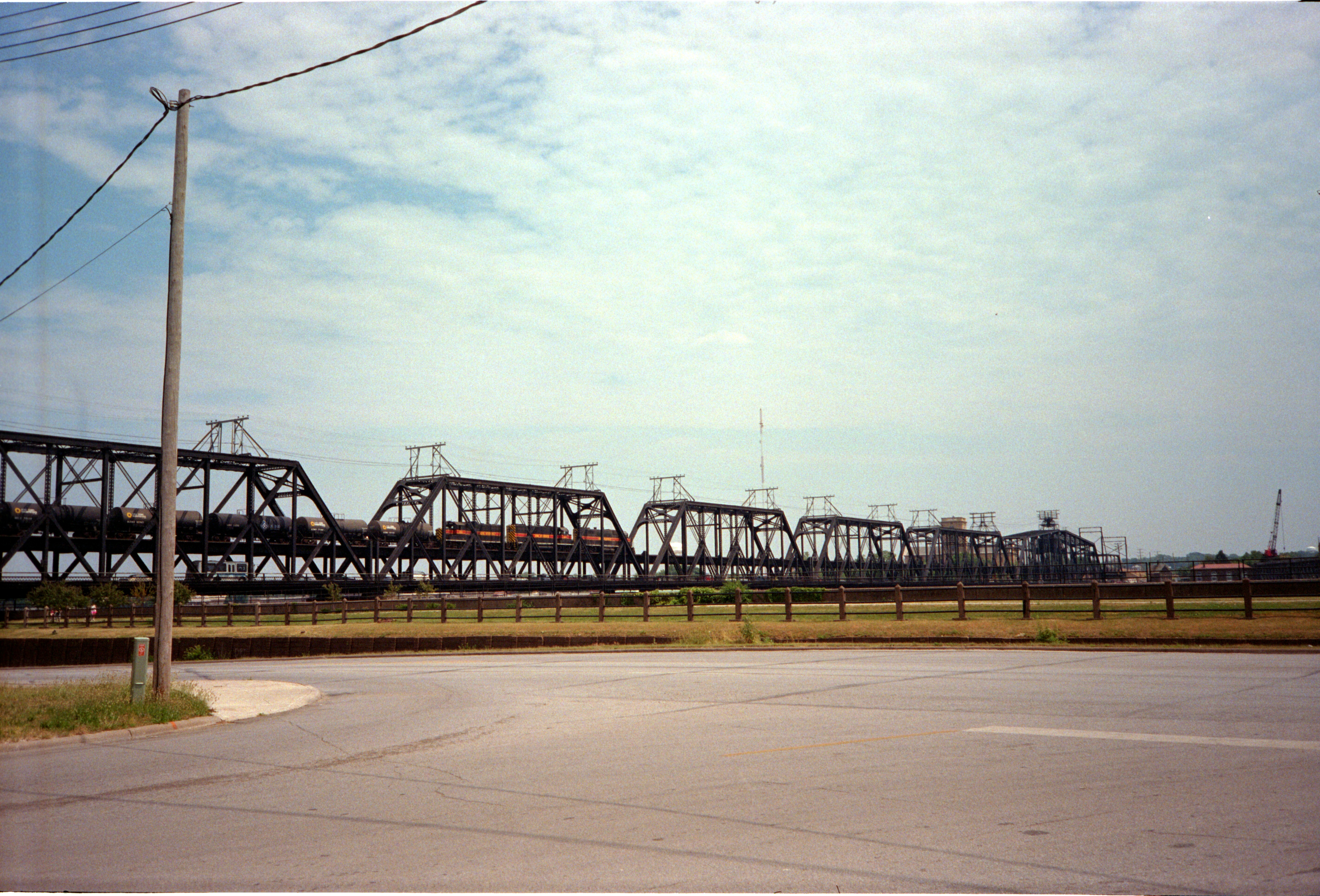604, 625, and 405 haul a rather rare mid-day eastbound over the Government Bridge in Davenport, IA, back in the summer of 1996