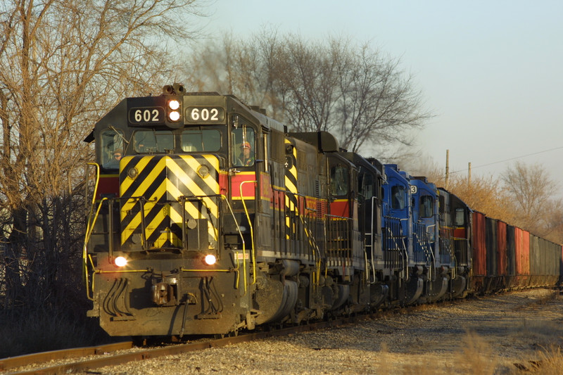 IAIS 602 and a loaded coal drag tie down in Moline, IL, on 26-Dec-2002