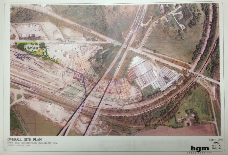 Overview of the south (TT east) end of the yard.  I just noticed yesterday (12/27/13) that the former greenhouse property west of (below) Harry Langdon Blvd. has been graded and staked now, so I'm guessing it'll soon be paved for additional trailer parking.