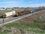 Westbound turn pulls through N. Star siding, to go around the steel gang working on the main at the west end.  Nov. 13, 2007.