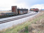 With the light getting low, the crew has 4 loads spotted on the west track, and after switching engines they pull the 2 mtys out and prepare to head west again.