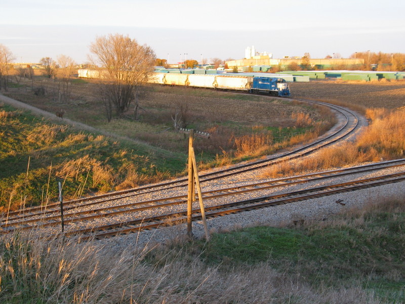 Wilton Local at JM.  Look closely and you'll see a buck deer standing on the highway embankment across the tracks.