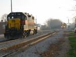 The west train has just set out 709 on the Cenpeco track in Walcott, and is in the process of picking up hoppers farther east at Walcott siding.  Nov. 7, 2006.