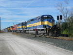 KCSP passes the intermediate signal at the south end of the new yard in Fruitland.