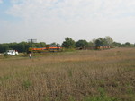 Westbound passes the rail train at the west end of N. Star siding, Oct. 5, 2007.