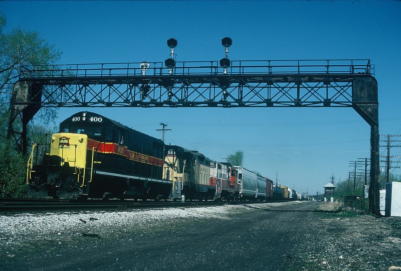 1May88 Westbound at MC tower in Joliet.