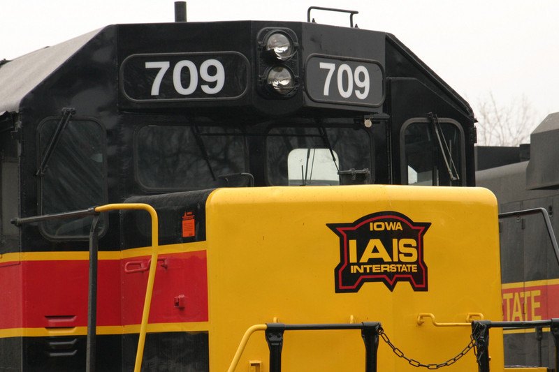 The distinctive IAIS logo on a solid yellow nose was the core difference in the Phase IV paint scheme, as seen here on 709 during December 2004.  The 700s had problems with the logo decals peeling off, however.