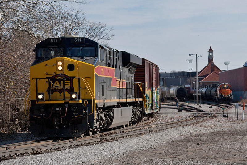 BICB-10 departs Rock Island while the BNSF local waits.