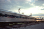 One of the cars filled with passengers passing west through Walcott